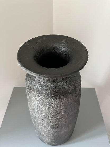 Birds eye view of a tall bali vase