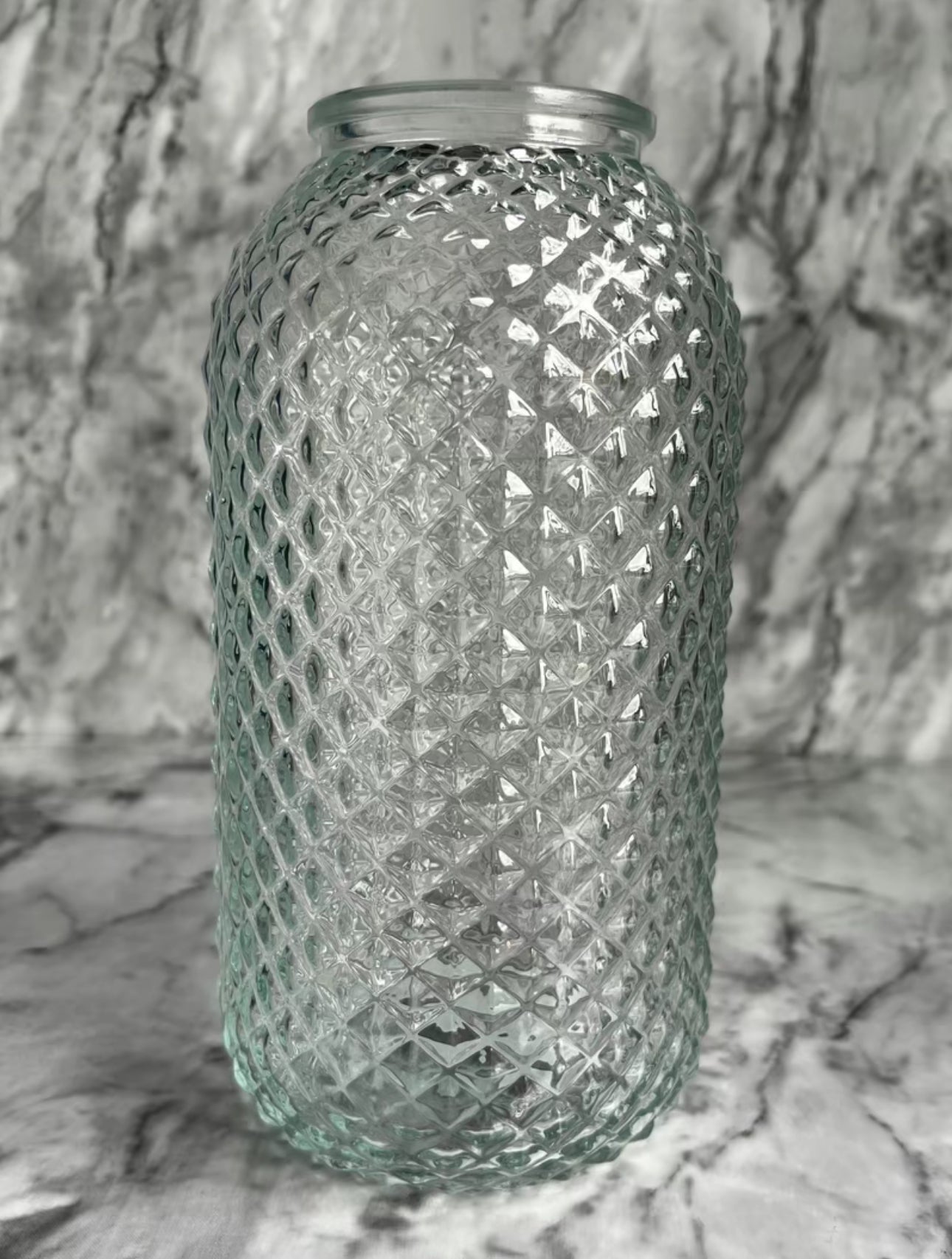 Large clear lola vase on a table