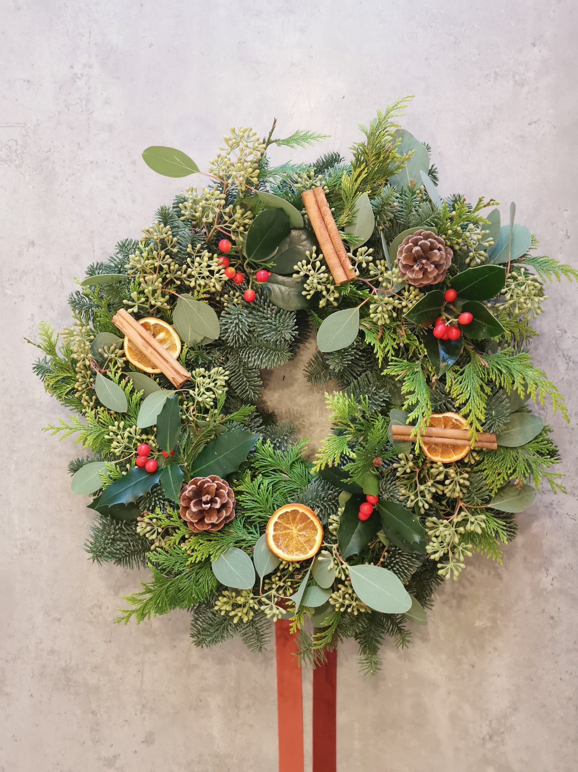 Christmas wreath example hung on a door