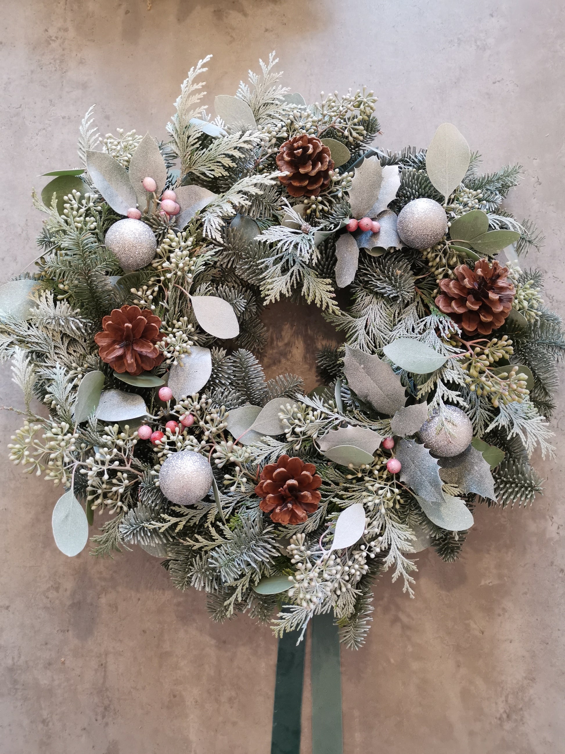 Christmas wreath example hung on a door