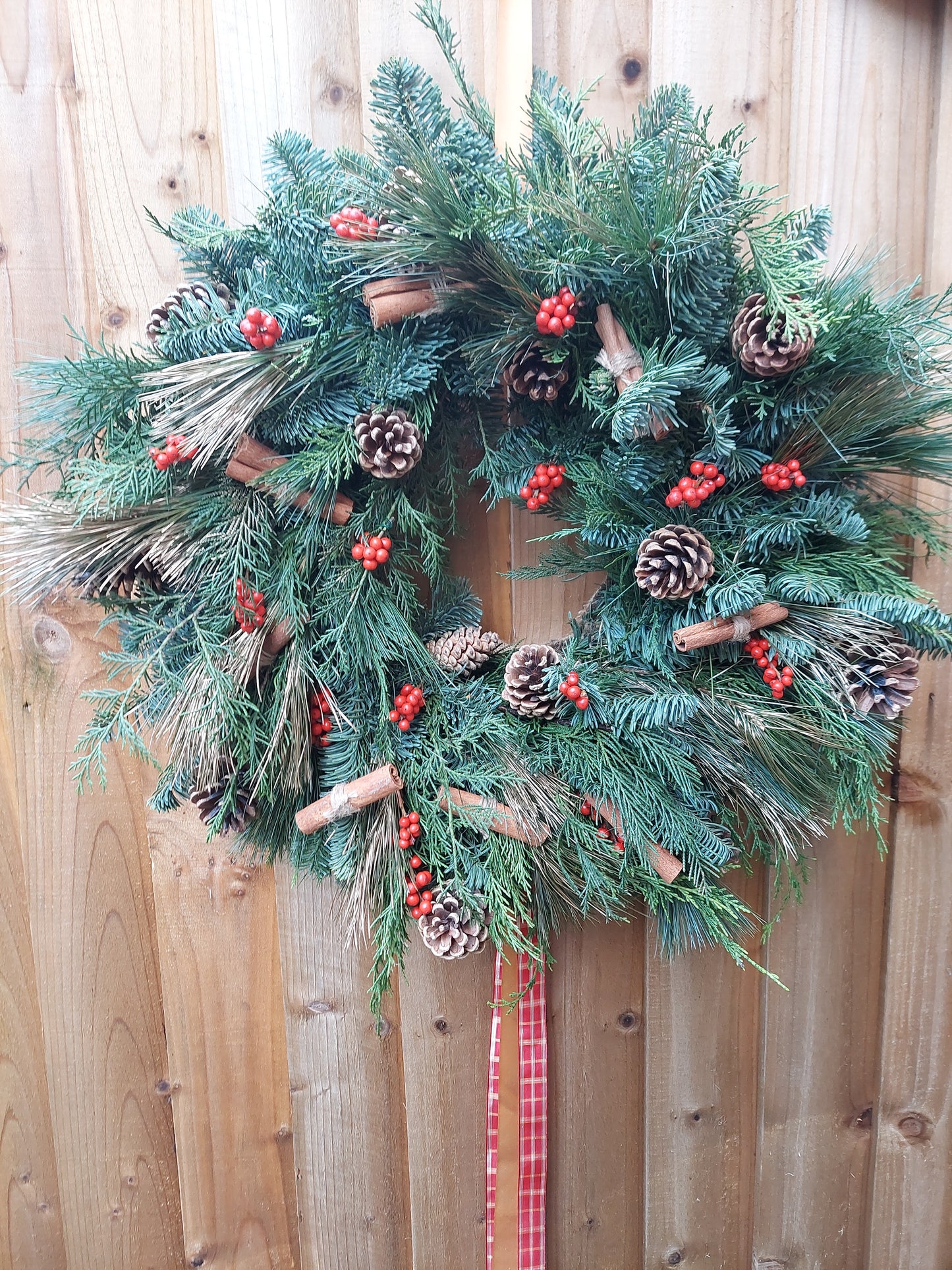 Christmas wreath example hung on a door