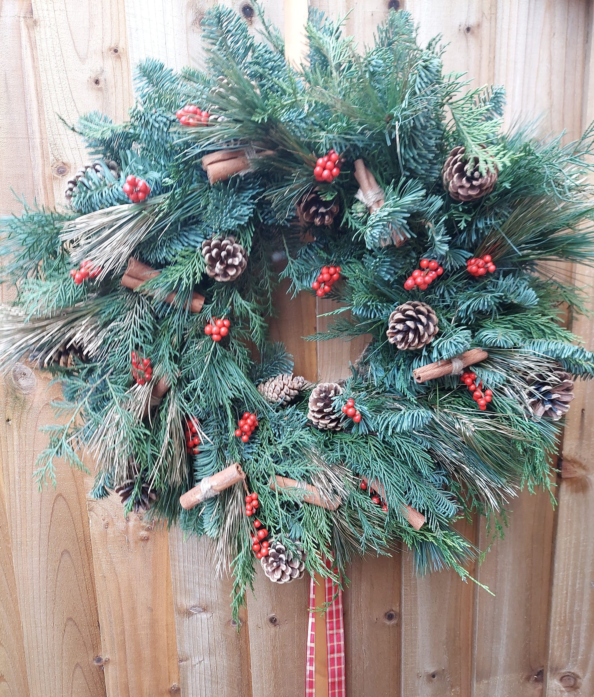 Christmas wreath example hung on a door